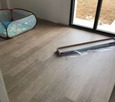 Pose du parquet dans chambre parentale