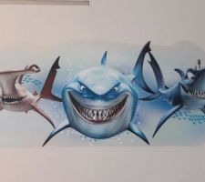 Collage de stickers repositionnables dans la chambre du grand