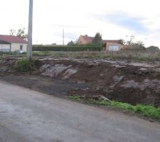 Remblaiement et busage du fossé devant le terrain