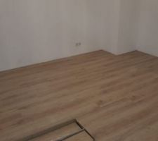 Pose du parquet dans la chambre parentale