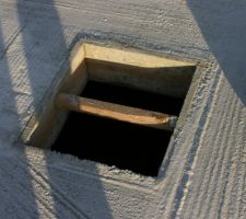 Le trou d'homme qui se trouvera dans le garage