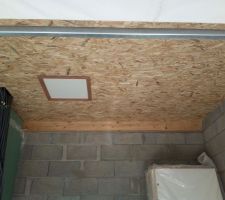 Pose des plaques OSB au plafond du garage