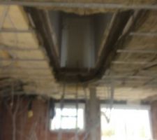 Isolation plenum entre RDC et étage avec laine de verre en partie centrale