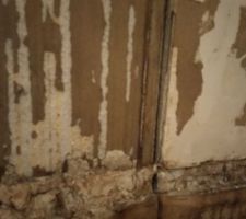 Cuisine en cours de démolition, état des murs...