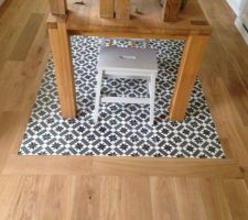 Tapis de carrelage sur parquet