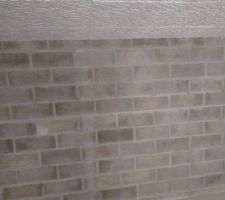 Les murs de mon sous sol avec les joints tirer au fer