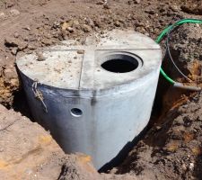 Installation de la cuve de récupération des eaux pluviales