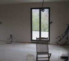Porte fenêtre donnant accès à la terrasse de 65m²
