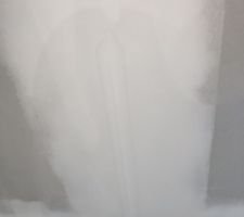 Bande mal réalisée et traces humidité