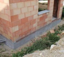 Finition des murs de soubassement