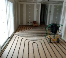 Installation de l'Isolant et des tuyaux de chauffage au sol