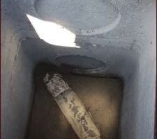 Regard pour nettoyage placé en limite de propriété