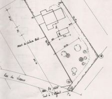 Vous voyez sur cette photo le plan de masse avec l'implantation de la maison