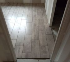 Début carrelage chambre parentale