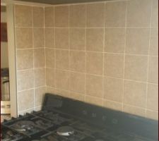 Le fond de hotte du piano de cuisson