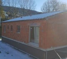 Maison sous la neige
