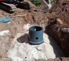 Installation de la cuve de récupération d'eau de pluie