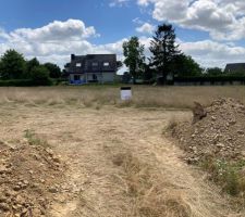 Placement du panneau avec le permis de construire.