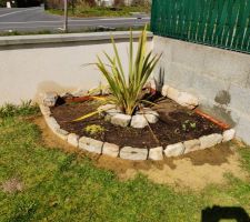 Évolution du parterre angle de mur en pierre granité.