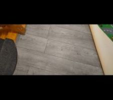 Parquets qui a br&ucirc;l&eacute; a cause d'&eacute;claboussure des soudures