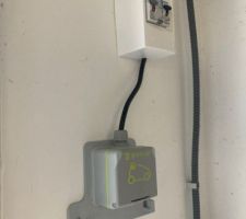 Installation d?une prise renforcée pour véhicule électrique.