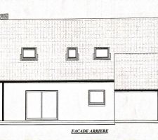 Vue de la face arrière de la maison exposée plein sud.