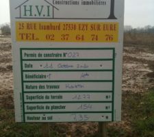 Pose du panneau du permis de construire