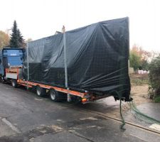 Arrivée de la maison sur les camions