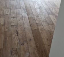 Parquet après la pose collée à cause de l'humidité