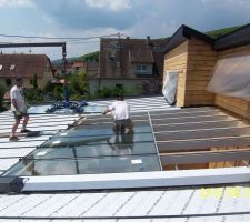 Mise en place des vitres avec grue