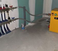 Mise en chauffe du plancher chauffant avant pose du carrelage par chaudière provisoire électrique.