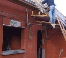 Le couvreur en pleine action