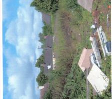 Photo prise par mon neuveux qui montre que le terrain nas pas etait nettoye comme il avait demander avent la signature