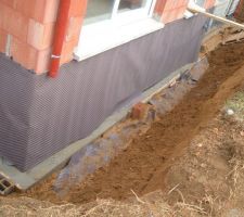 Réalisation coffrage en béton pour réaliser la pente .