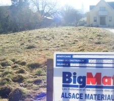 Photo du terrain et du permis de construire