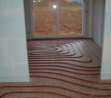 Mise en place Plancher chauffant .