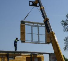 Déchargement des panneaux bois