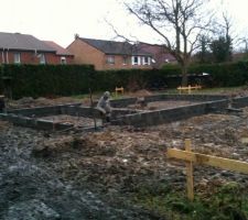 La pose des libages (Parpaings pleins)