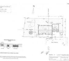 Voici le PCMI 2. On y voit le niveau de la maison 0.00 et du garage -0.15 ainsi qu'une annotation qui stipule bien que le niveau du RDC est au niveai de la référence c'est à dire 243.80m.