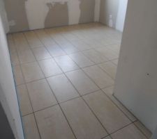 Pose du carrelage dans les chambres
