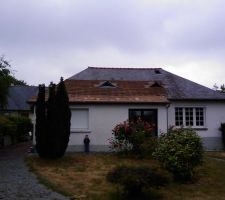 D&eacute;pose d'une partie de la couverture pour permettre la mise en place de l'extension.