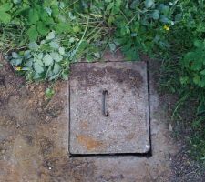 Photo du regard du raccordement de l'eau du domaine public vers la limite de propriété.