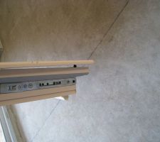 Une baguette de porte fenêtre hs.