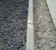 Remplacement des bordures de trottoirs pour faire passer la voiture