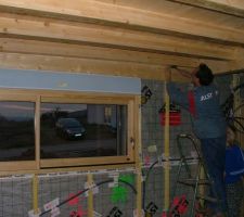 Pose du premier lambris