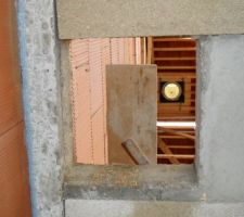 Zoom sur passage conduit cheminée.