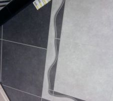 Le carrelage est choisit, gris foncé pour la cuisine et gris clair pour la pièce de vie