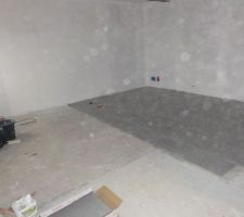 Pose carrelage salon