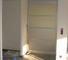 01072009 pose porte coulissante entre cuisine et SAM