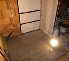 Pose carrelage dans le cellier